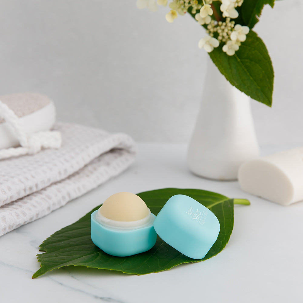 Turquoise Magic Lip Balm Lid Off Lifestyle Image - Active Silver