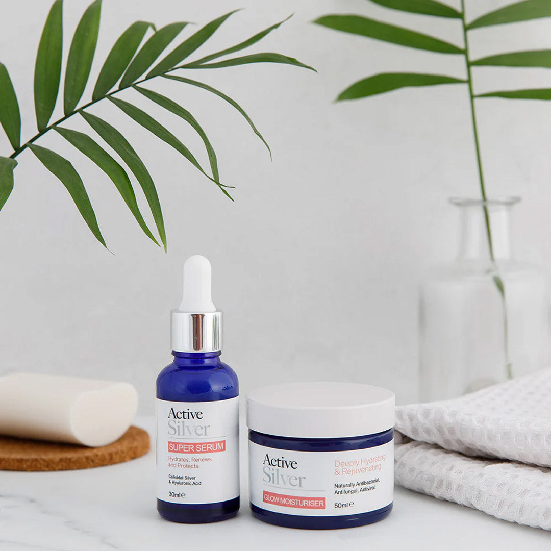 Active Silver Super Serum & Glow Moisturiser Duo In Bathroom