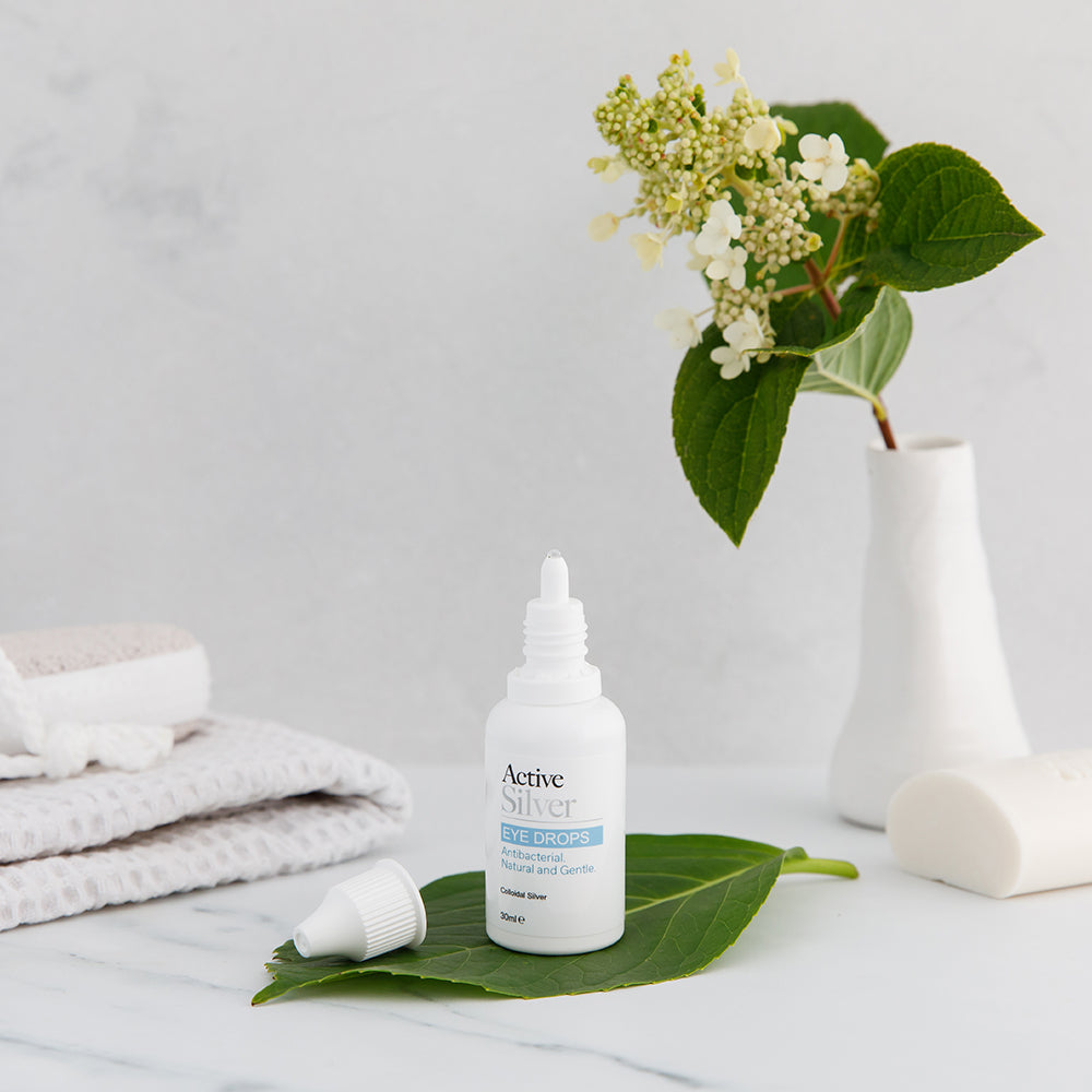 Active Silver Natural and Gentle Eye Drops on a bathroom counter top