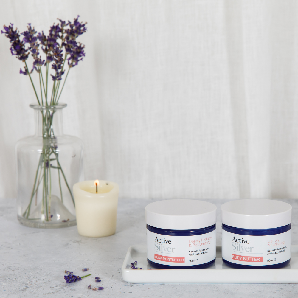 Active Silver Glow Moisturiser And Body Butter Duo in 50ml In Bathroom