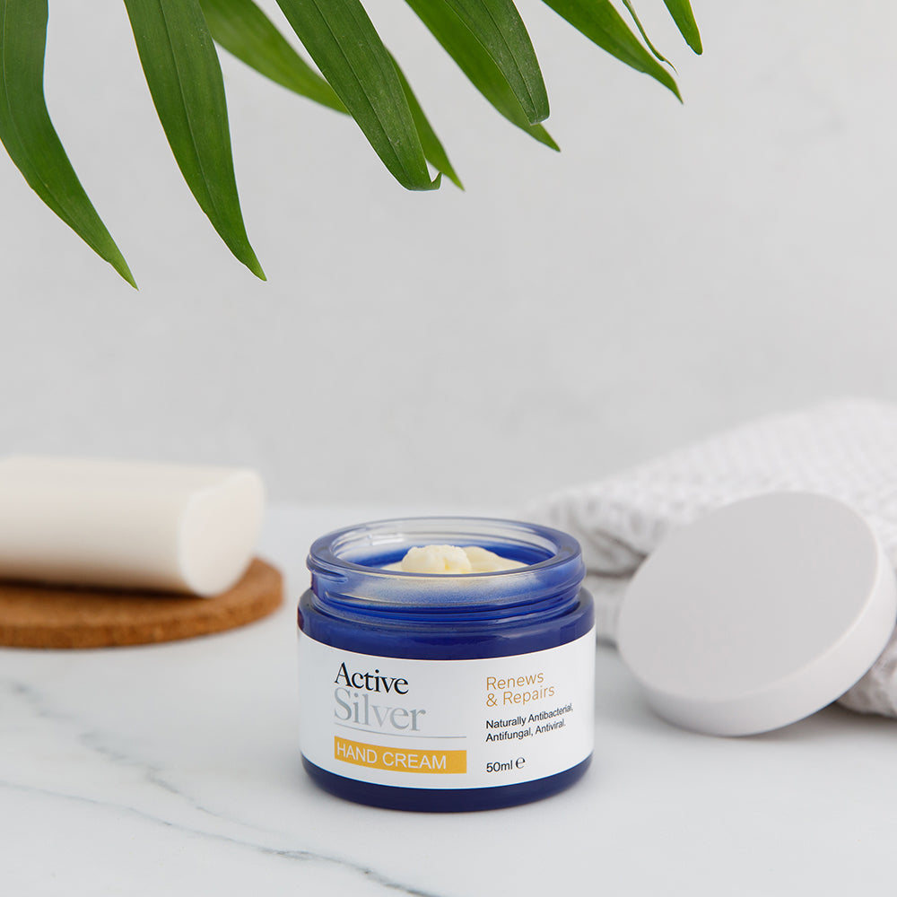 Active Silver Hand Cream Lid Off Lifestyle Image